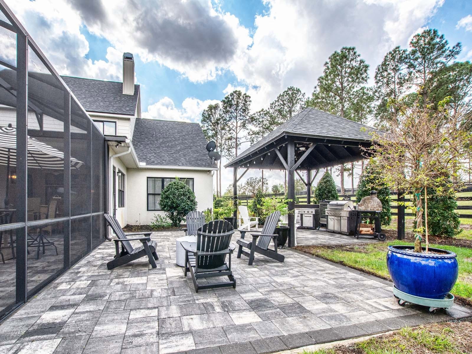 Screened patio and gazebo of a Mosco custom home
